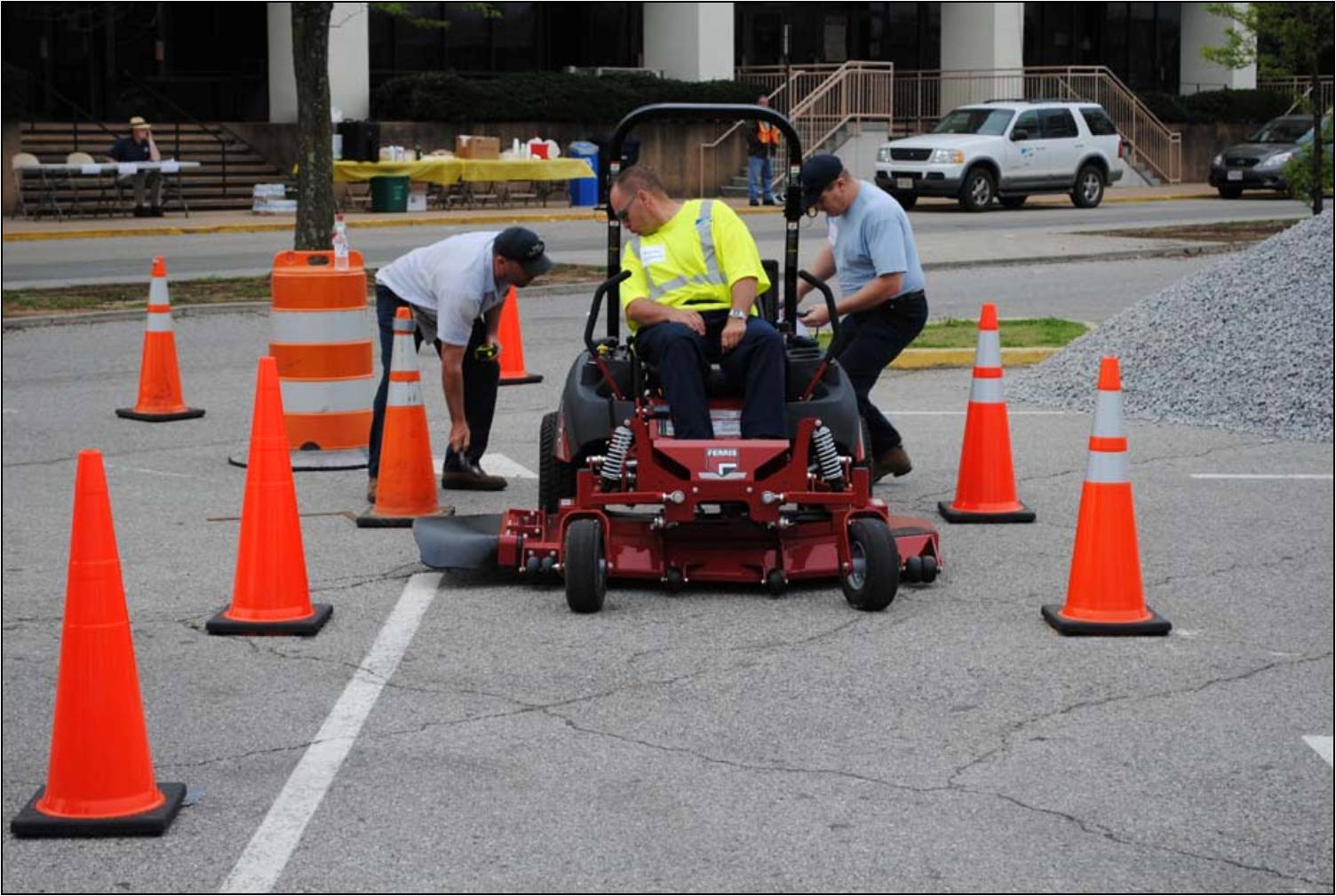 Town of Vinton employees Kevin and Mike measuring up the competition in the Zero Turn Mower event.